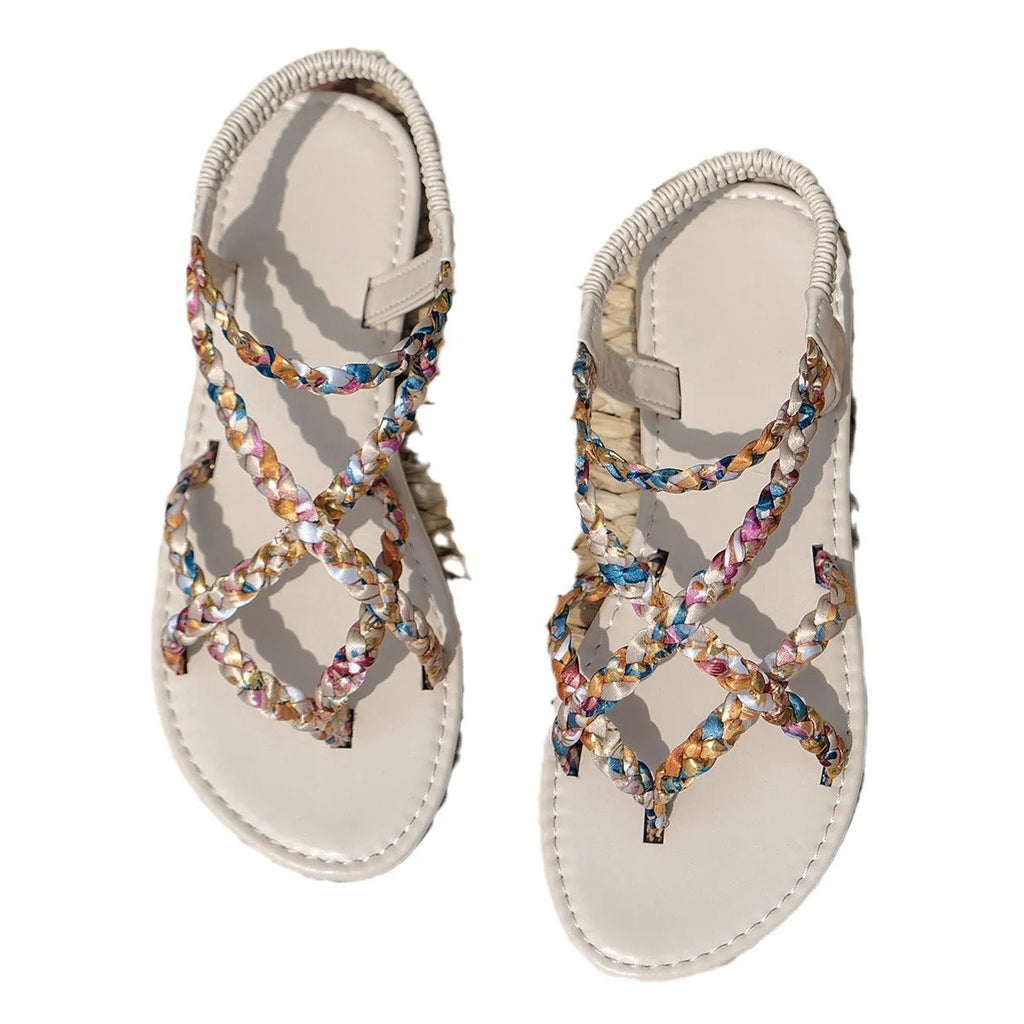 Adult flat sandals with elastic band and cloth upper in black or white colours