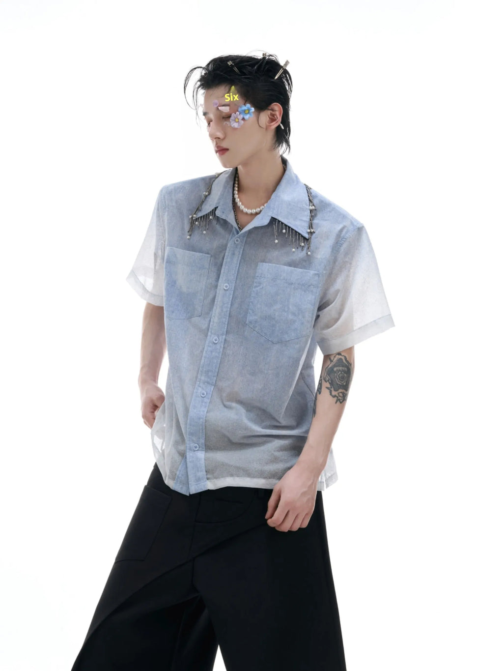 Blue gradient loose fit half sleeve polyester summer shirt laid flat.