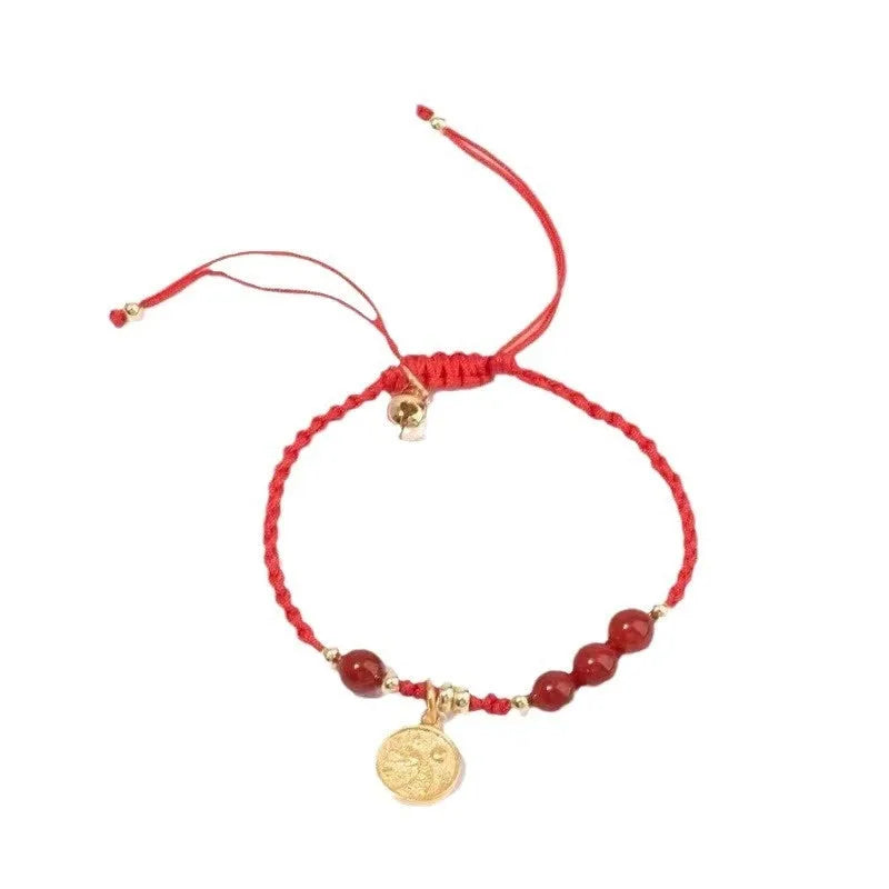 Cinnabar ethnic bracelet with braided rope strap and blessing charm for exam luck symbolism