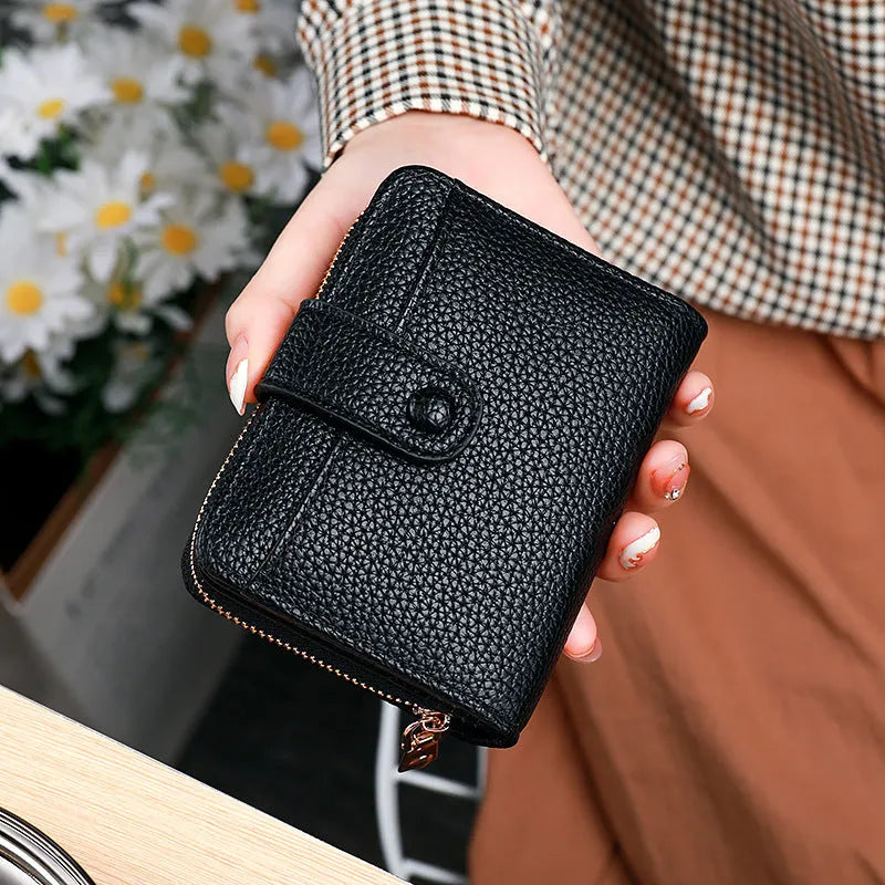 Women's lychee pattern short wallet in PU leather, shown in beige, pink, black, and red colour options.