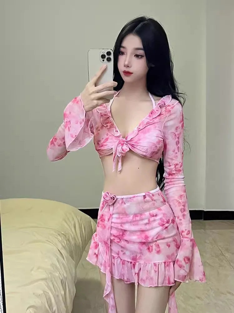 Women's floral bikini swimsuit in cherry blossom pink on a mannequin