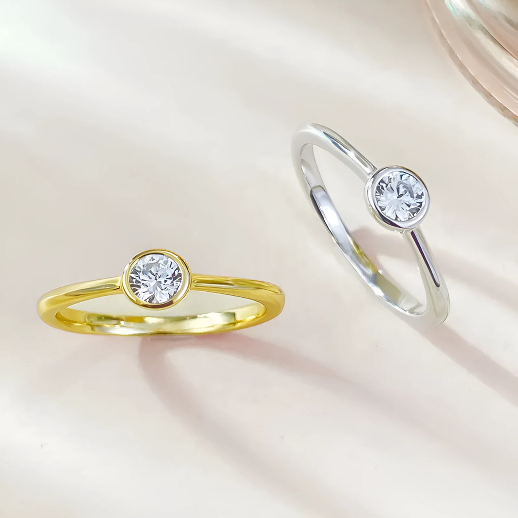 Minimalist silver crown ring with linear detailing in electroplated R962 platinum or gold finish