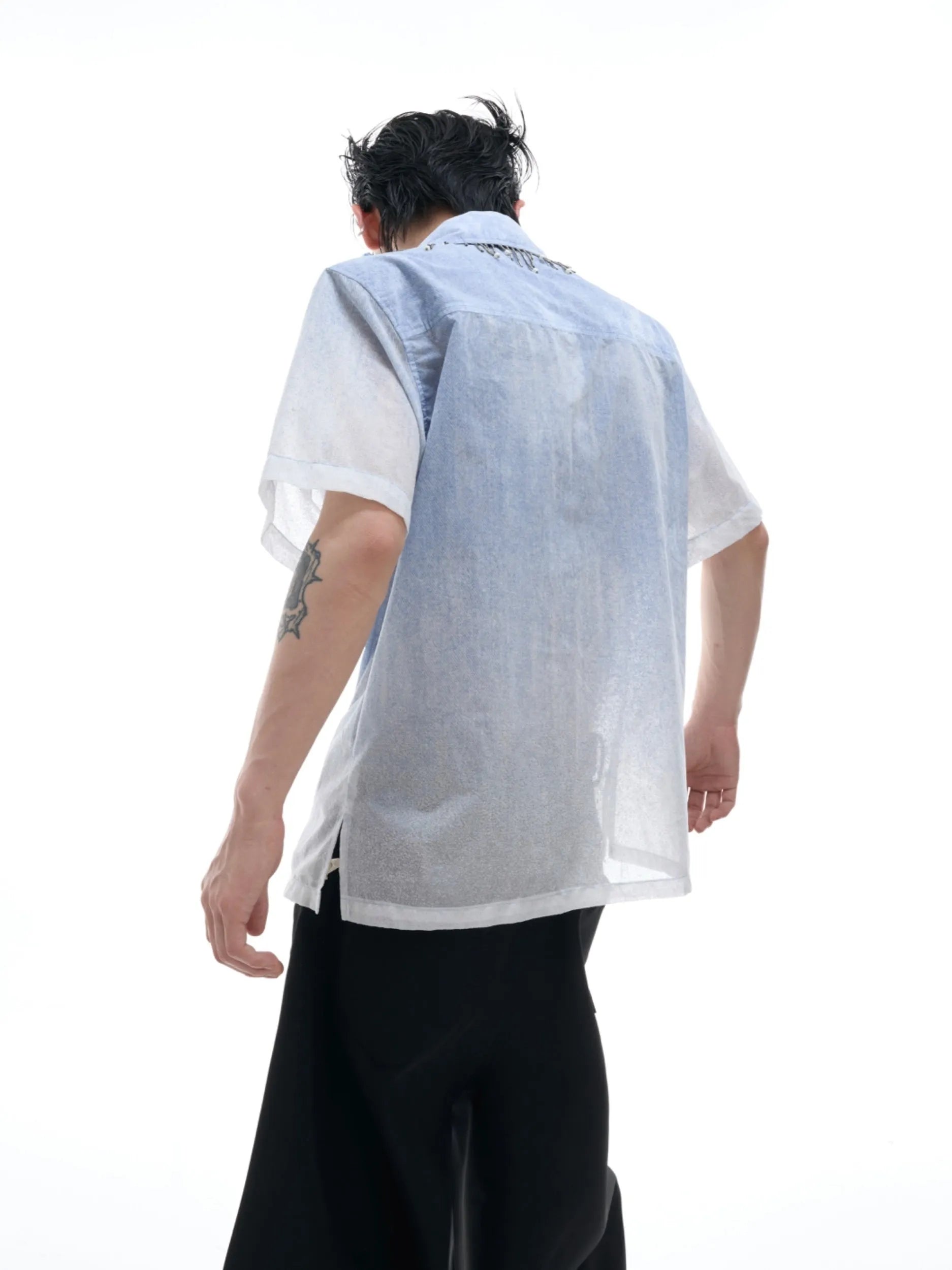 Blue gradient loose fit half sleeve polyester summer shirt laid flat.
