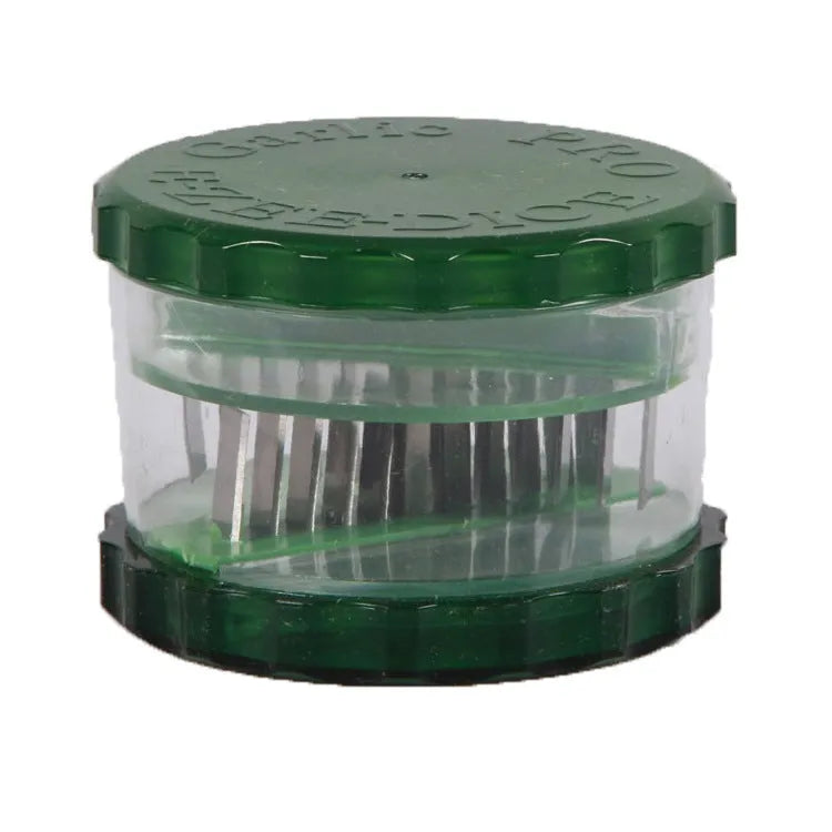 Green transparent PP garlic peeler kitchen gadget measuring 8.5cm wide