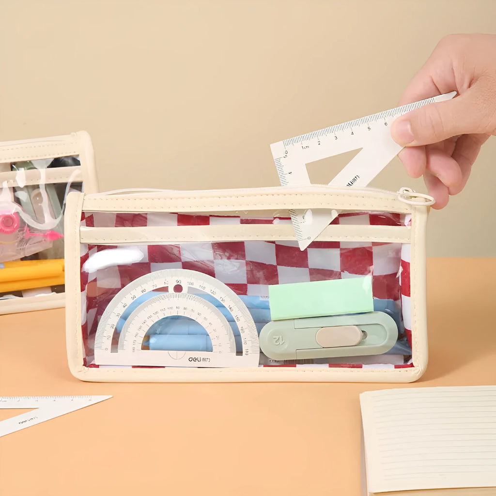 Transparent PVC pencil case with chessboard pattern, showing pens inside, dimensions 21.5cm by 8cm by 11.5cm