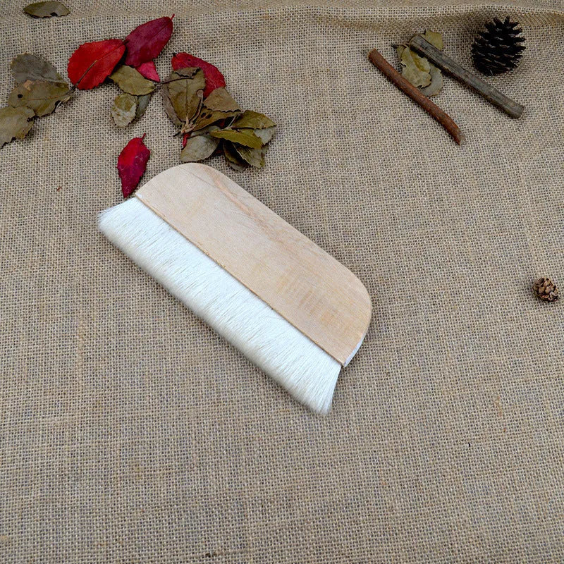 Wool brush for mounting diamond painting canvases, available in multiple sizes.