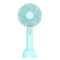 Blue mini silent USB handheld fan with oscillation, shown on a desktop.