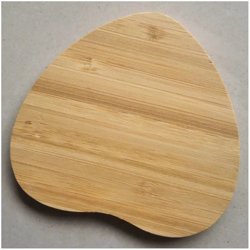Square wooden bamboo 5W Qi wireless charger on a surface