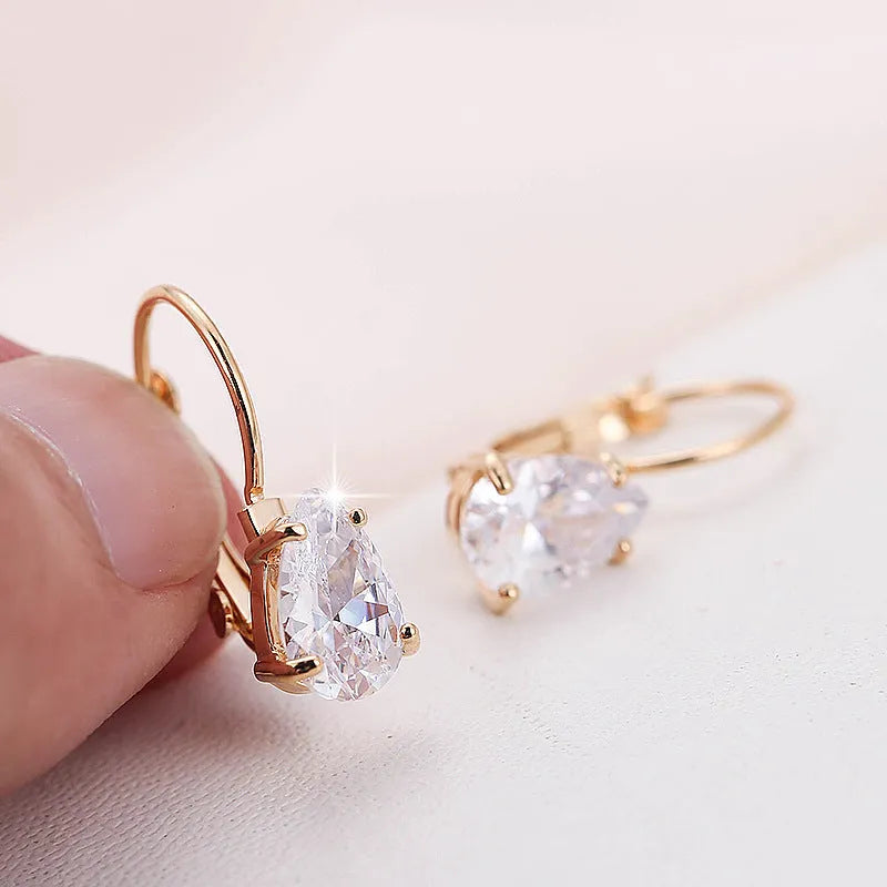 Women's drop-shaped copper earrings with platinum/kplatinum inlaid gems in gold or platinum colour