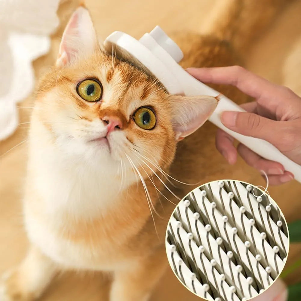 Blue self-cleaning cat grooming brush with rubber-tipped metal pins and ergonomic rubber handle