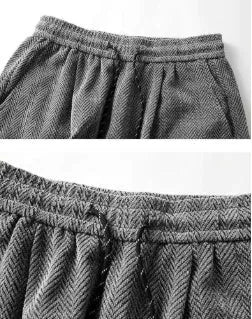 Plus size lightweight hollow-out trousers with fleece lining and elastic waist in black, straight-leg design.
