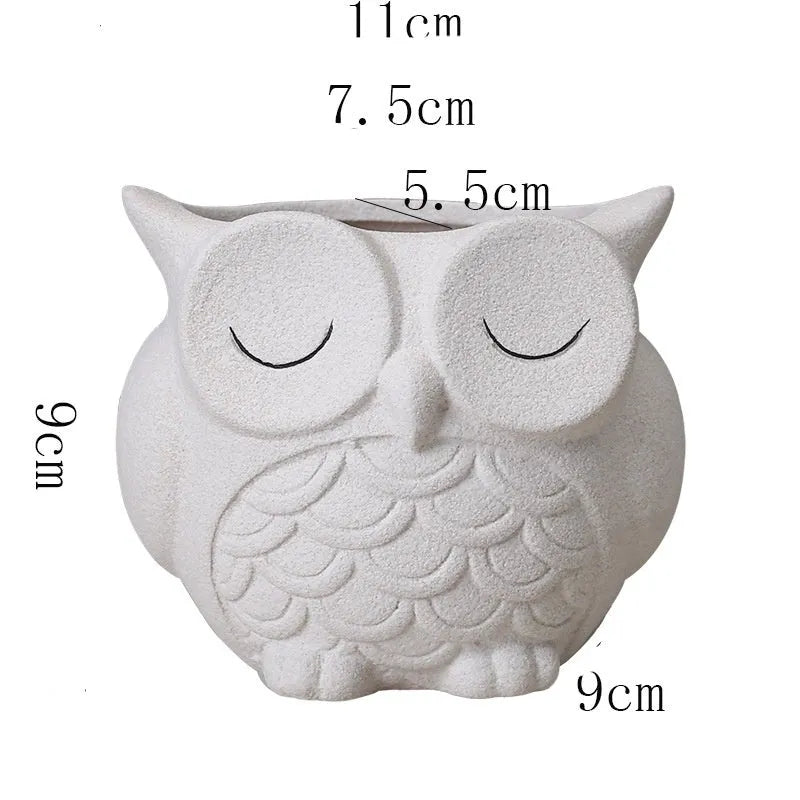 Ceramic succulent flower pot with frosted cartoon owl design measuring 11cm high by 9cm wide