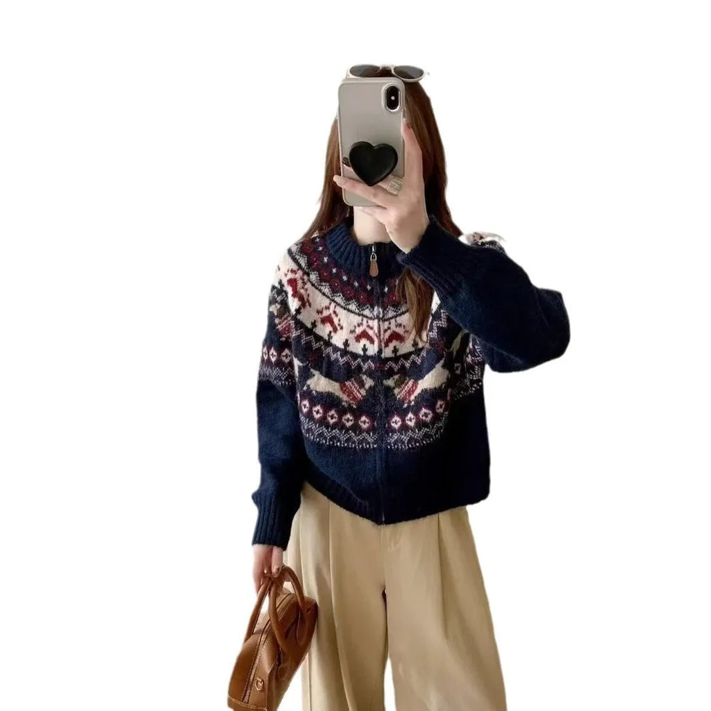 Beige ethnic Jacquard pattern pullover sweater with 3D effect and round neck on a hanger.