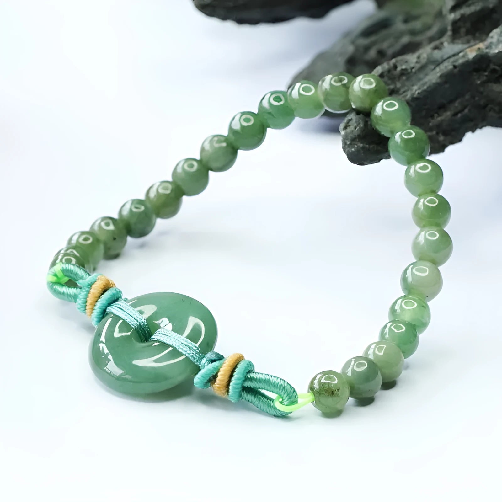Oil green jade bracelet with safety buckle and star shape design measuring 6mm thickness