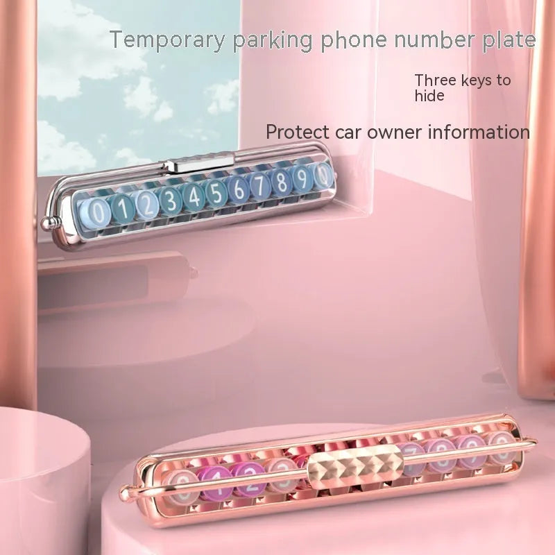 Plastic temporary parking number plate in multiple colour options on a car dashboard.
