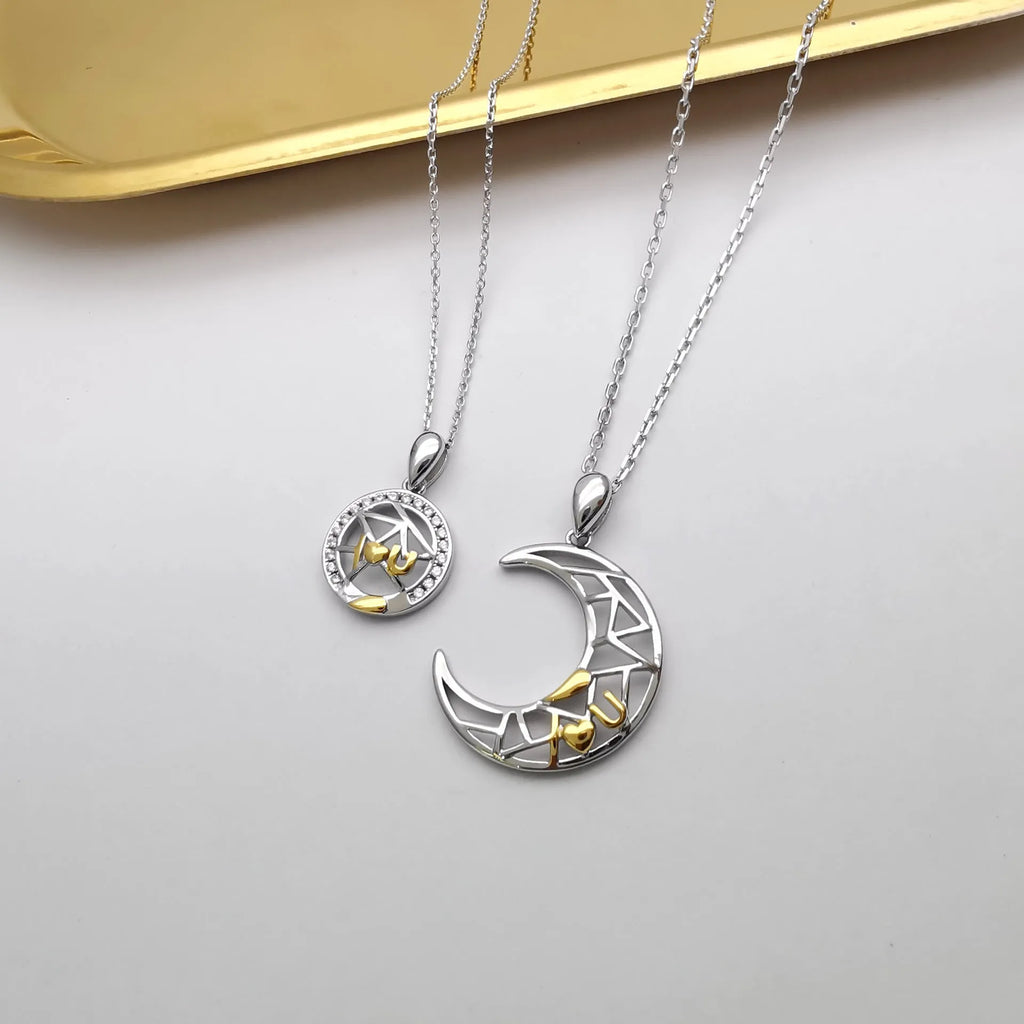Copper sun and moon tooth couple necklace set with electroplated finish on a cross chain.
