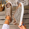 Women's plus size black sequined flat board shoes with front lace-up detail.