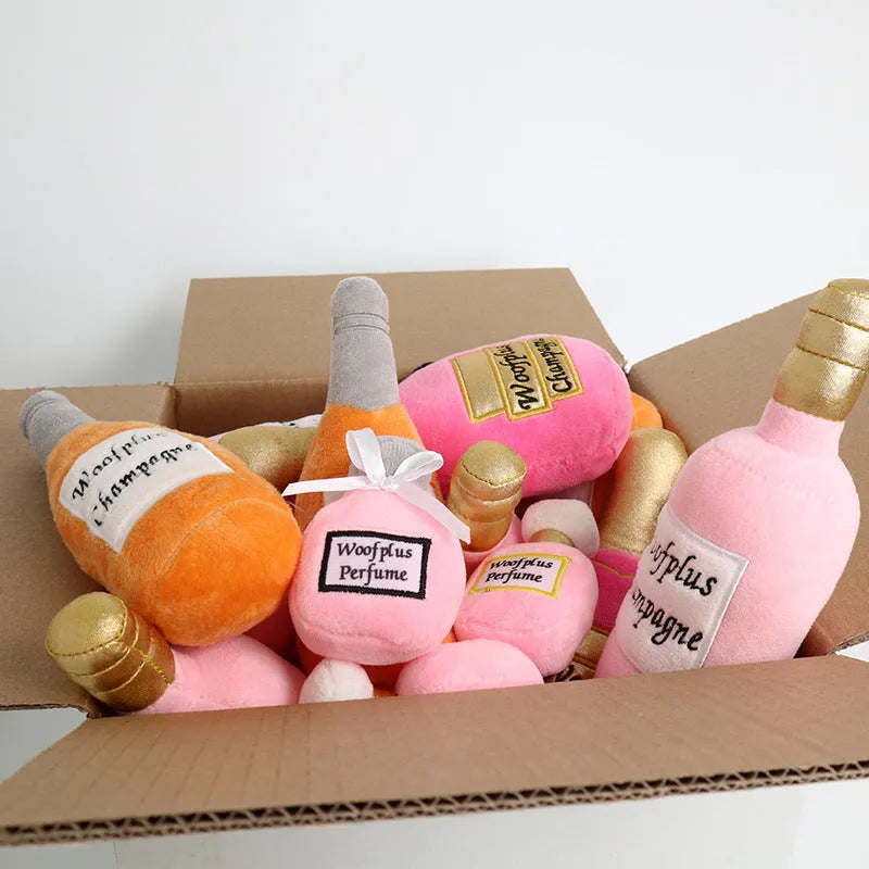 Plush wine bottle shaped dog toy in assorted colours with soft textile material