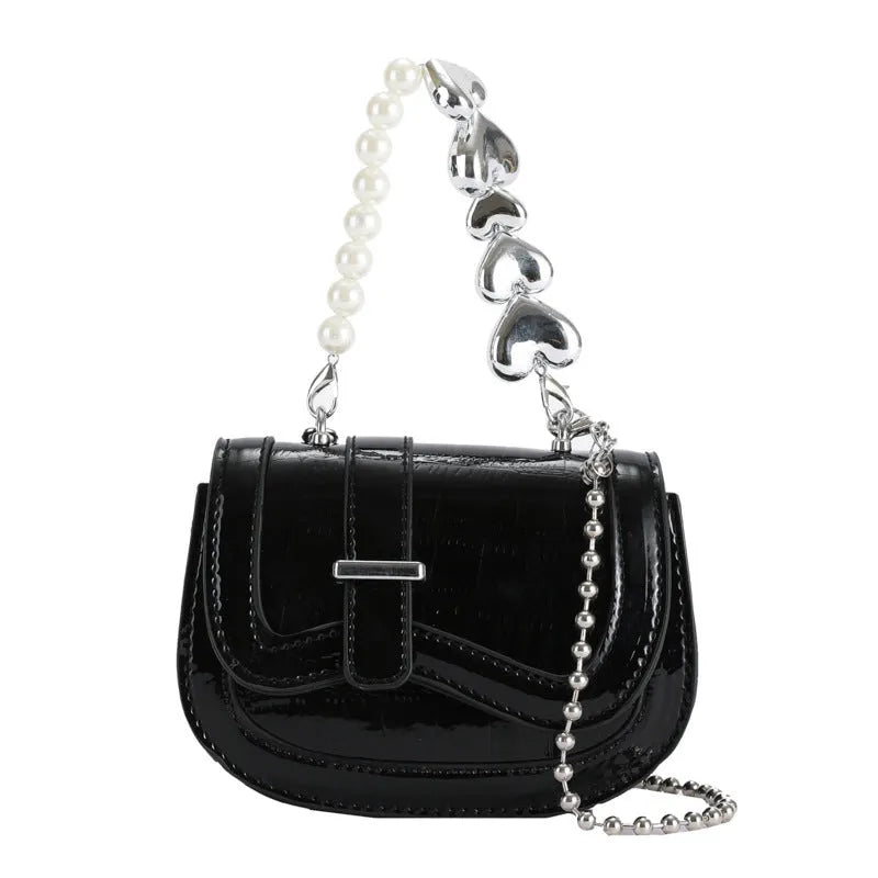 Women's silver PU mini saddle crossbody bag with phone pocket and single shoulder strap