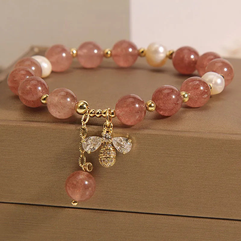 Women's strawberry quartz and freshwater pearl bracelet with zircon details in alloy setting