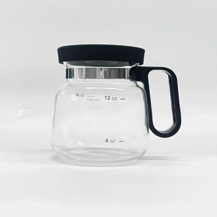 Transparent borosilicate glass coffee maker with removable silicone cover showing modern simple design