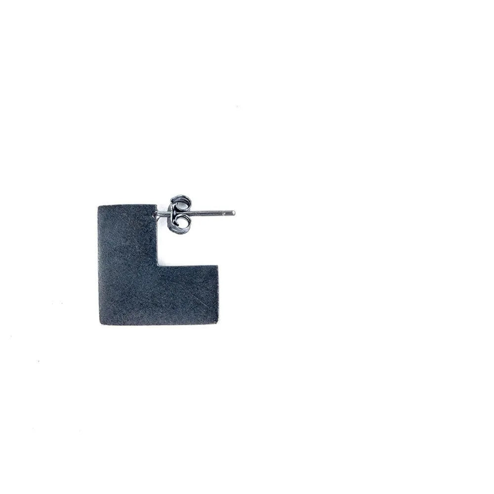 Oxidation black geometric square sterling silver earrings on a white background.