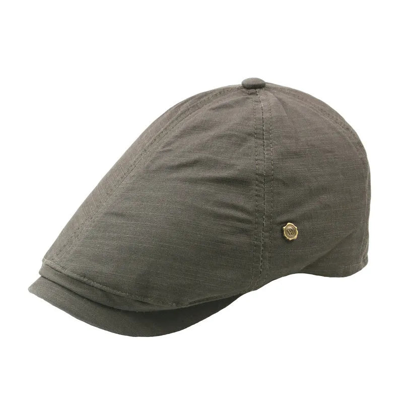 Plaid men's flat cap with copper button in cotton linen, distressed finish, adjustable fit, solid colour collection