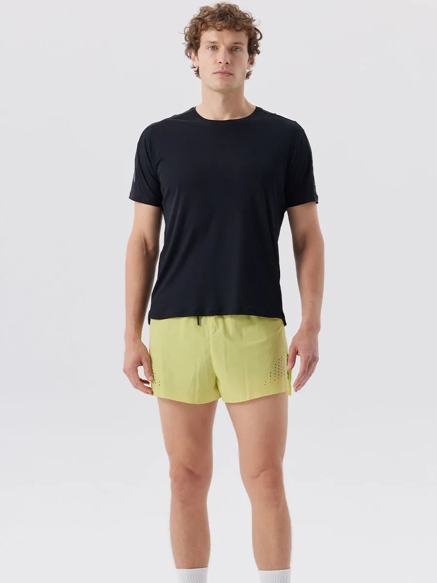 Men's straight-leg sports shorts with side slits in turmeric yellow colour, showing athletic design with micro elastic nylon fabric
