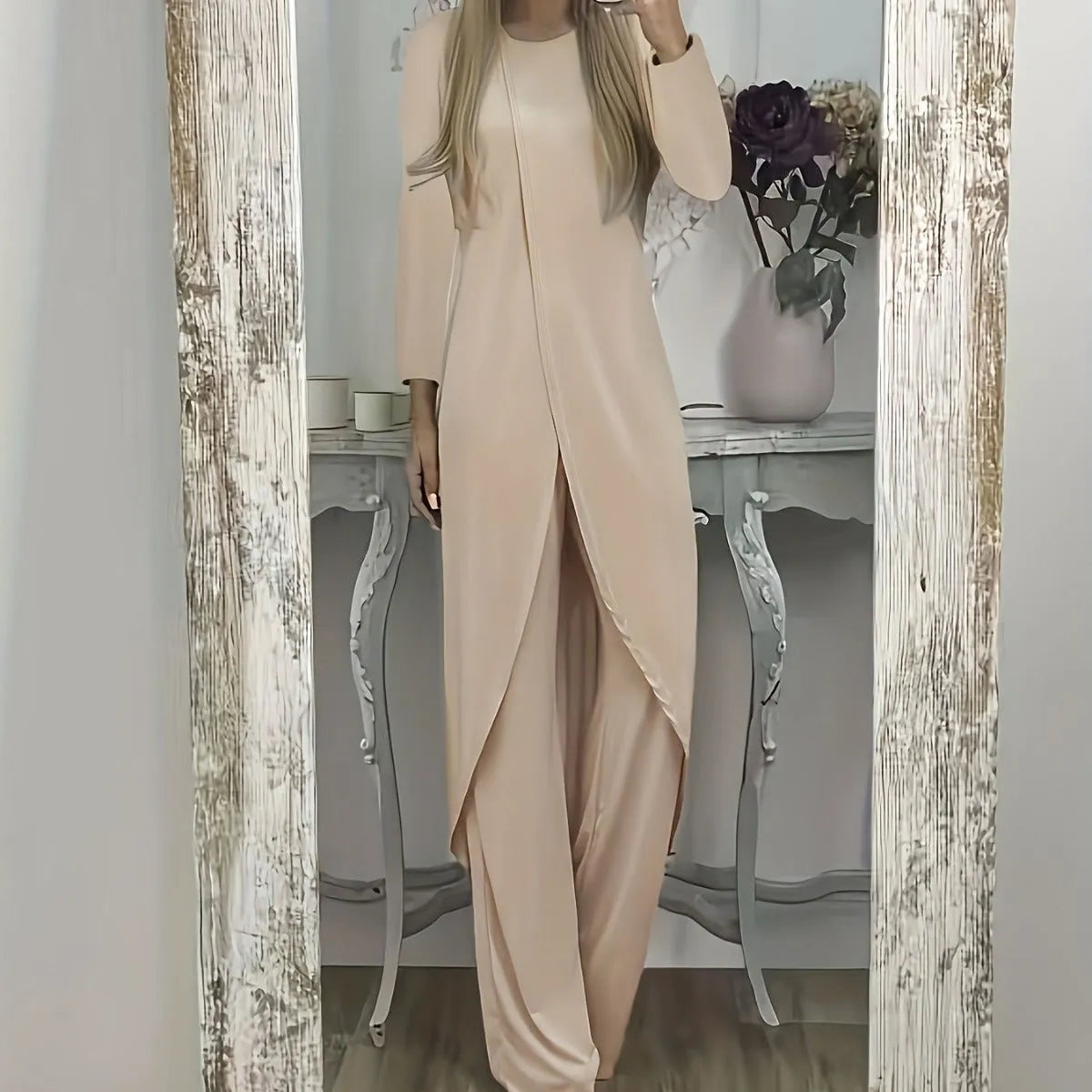 Casual two-piece clothing set with long sleeves and loose fit in black colour showing front view
