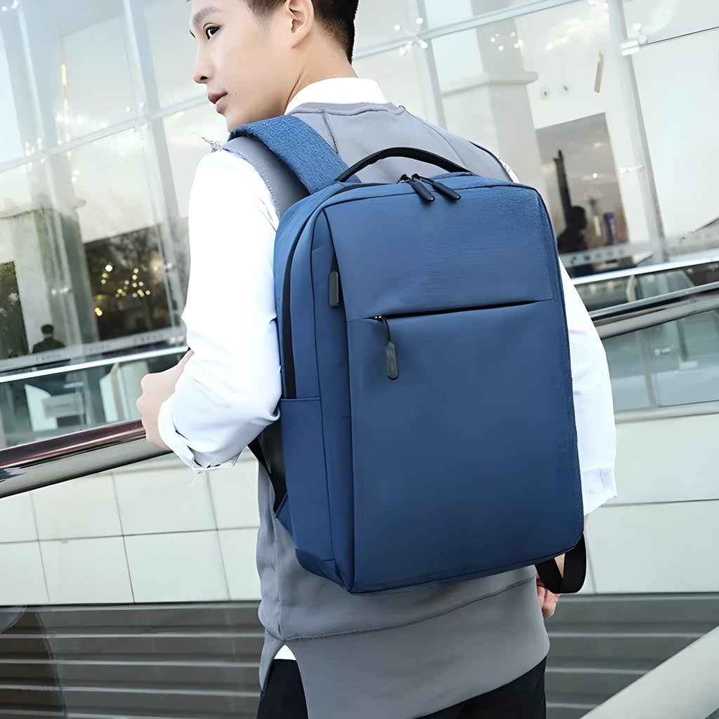 Large black sports backpack for college students with multiple compartments and curved shoulder straps