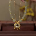 Green Xiangyun lock double-layer safety pendant bracelet with electroplated finish