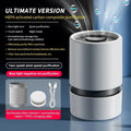 White simple-style desktop air purifier with USB cable on a wooden desk.