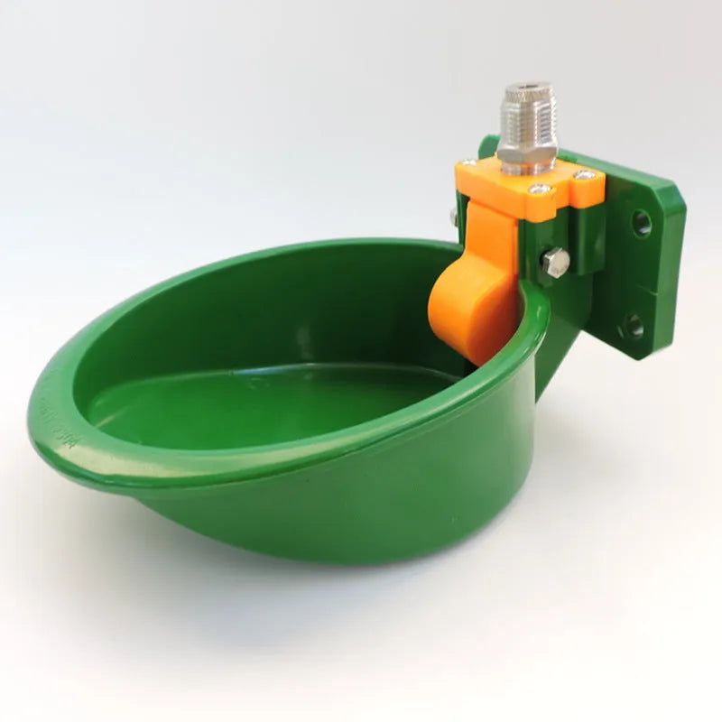 Green plastic drinking bowl for sheep with specialised nozzle design