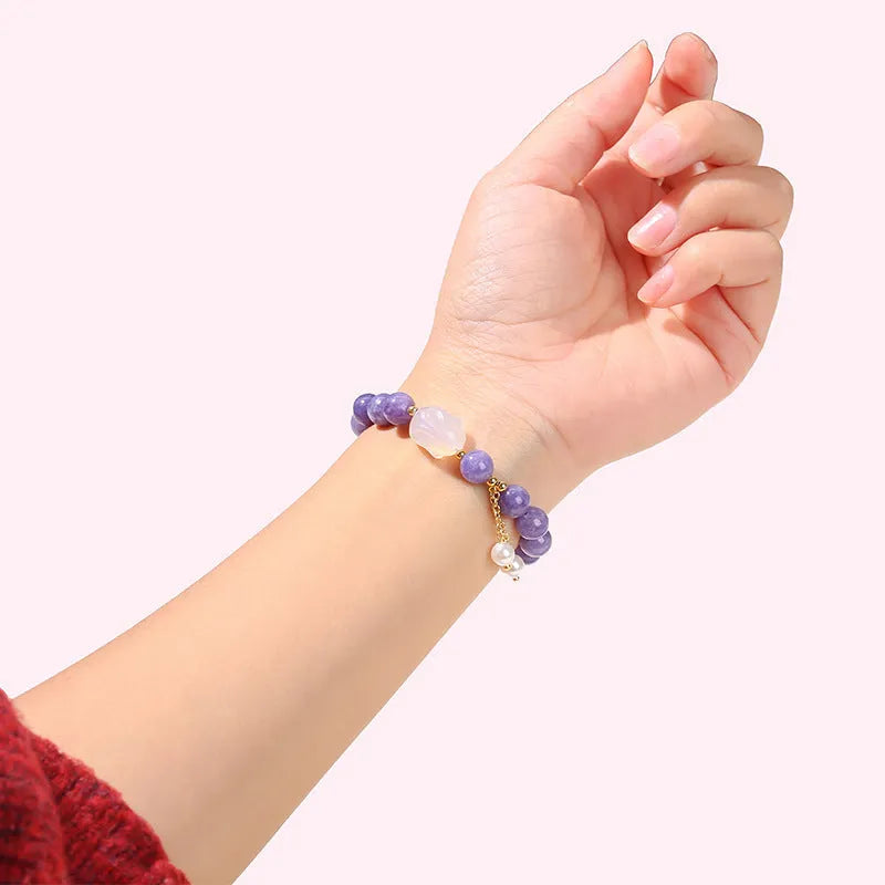 Purple aquamarine and lychee jelly agate rabbit bracelet with geometric design and round elements