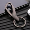 Black zinc alloy car key chain with two metal rings and a waist-hanging clip.