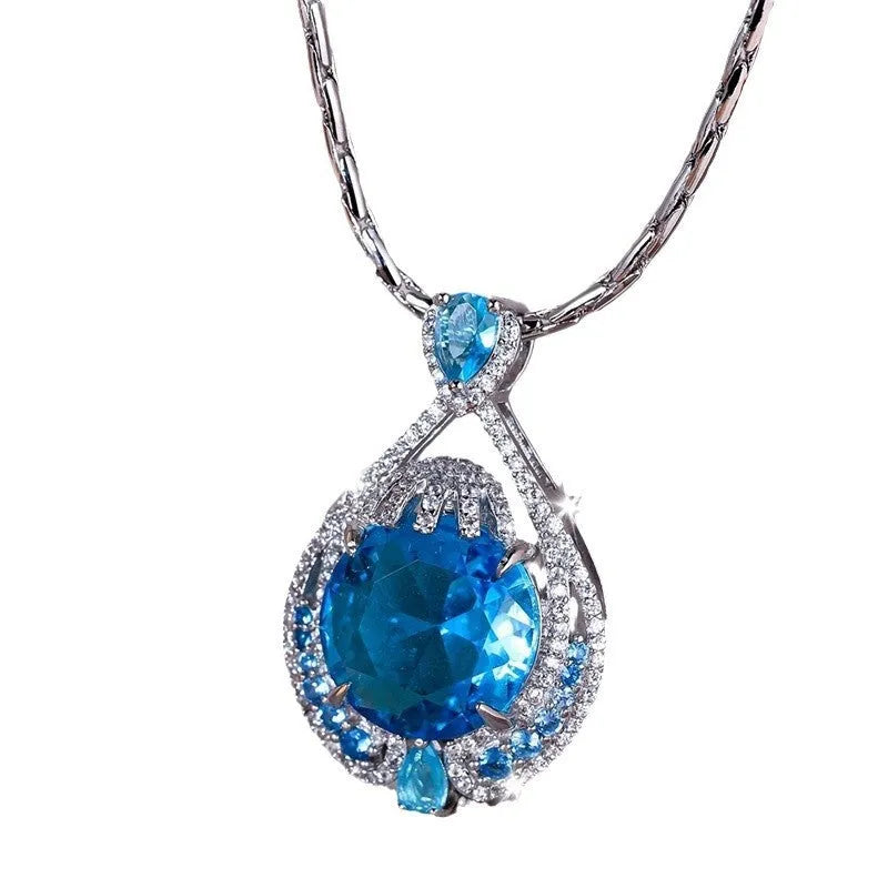 Blue crystal pendant necklace with geometric shape on water wave chain