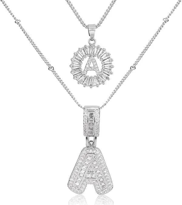 18K gold plated copper alphabet pendant necklace letter A with melon seeds chain on white background