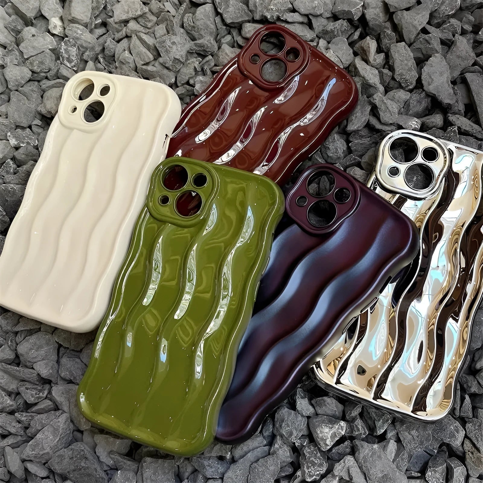 Soft silicone iPhone 17 phone case with water ripple pattern in beige, burgundy, green, silver, or purple colour.
