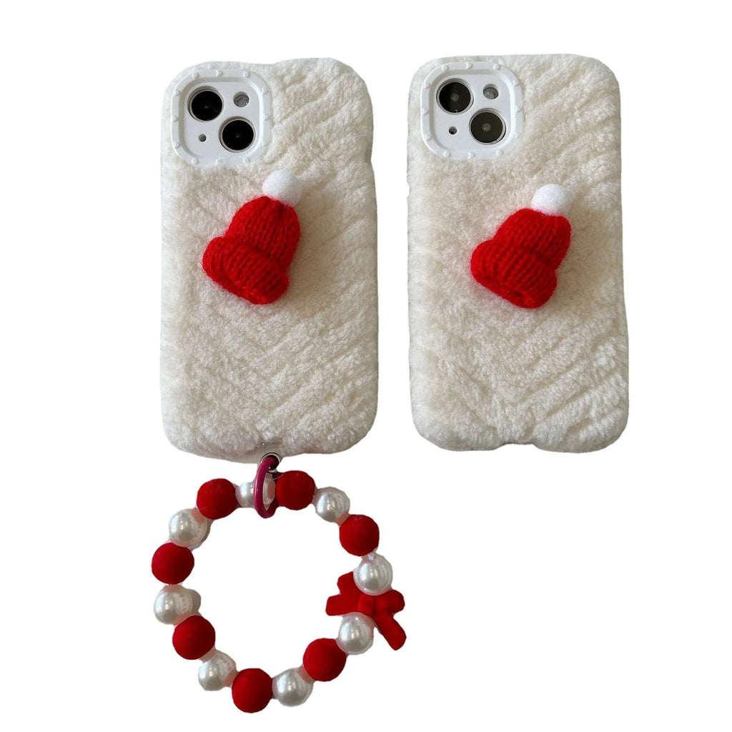 Red silicone iPhone back cover with attached plush Christmas hat bracelet