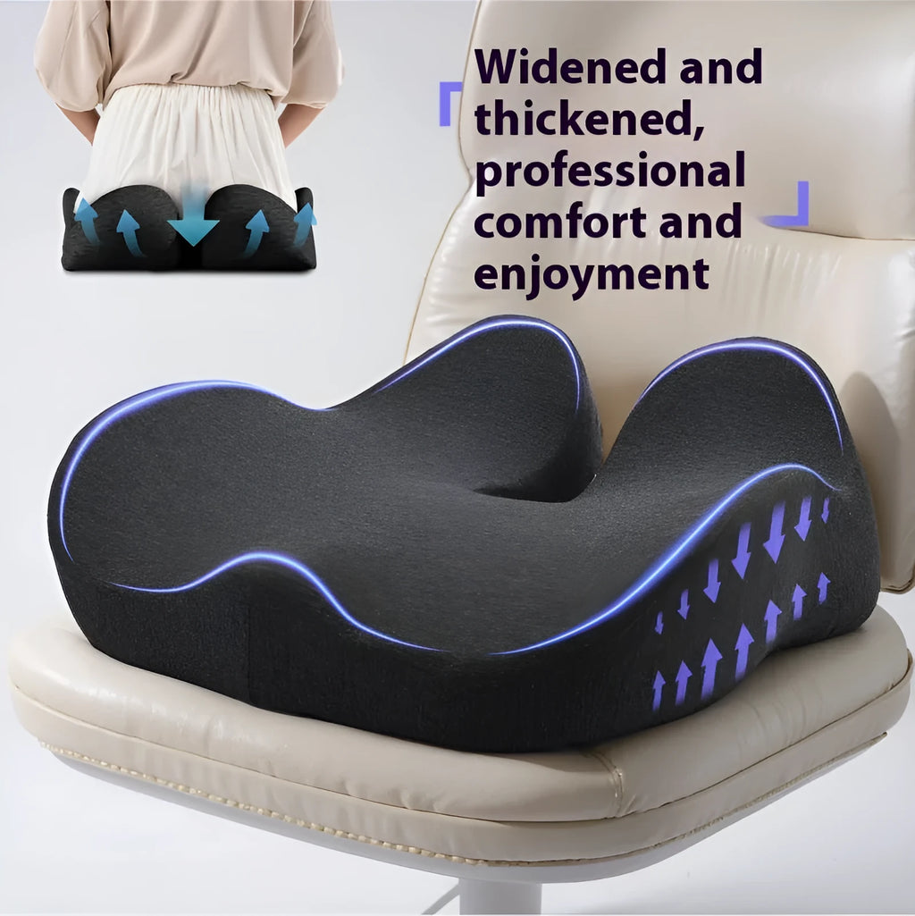 Light grey memory foam office chair cushion showing its thickness on a desk chair.