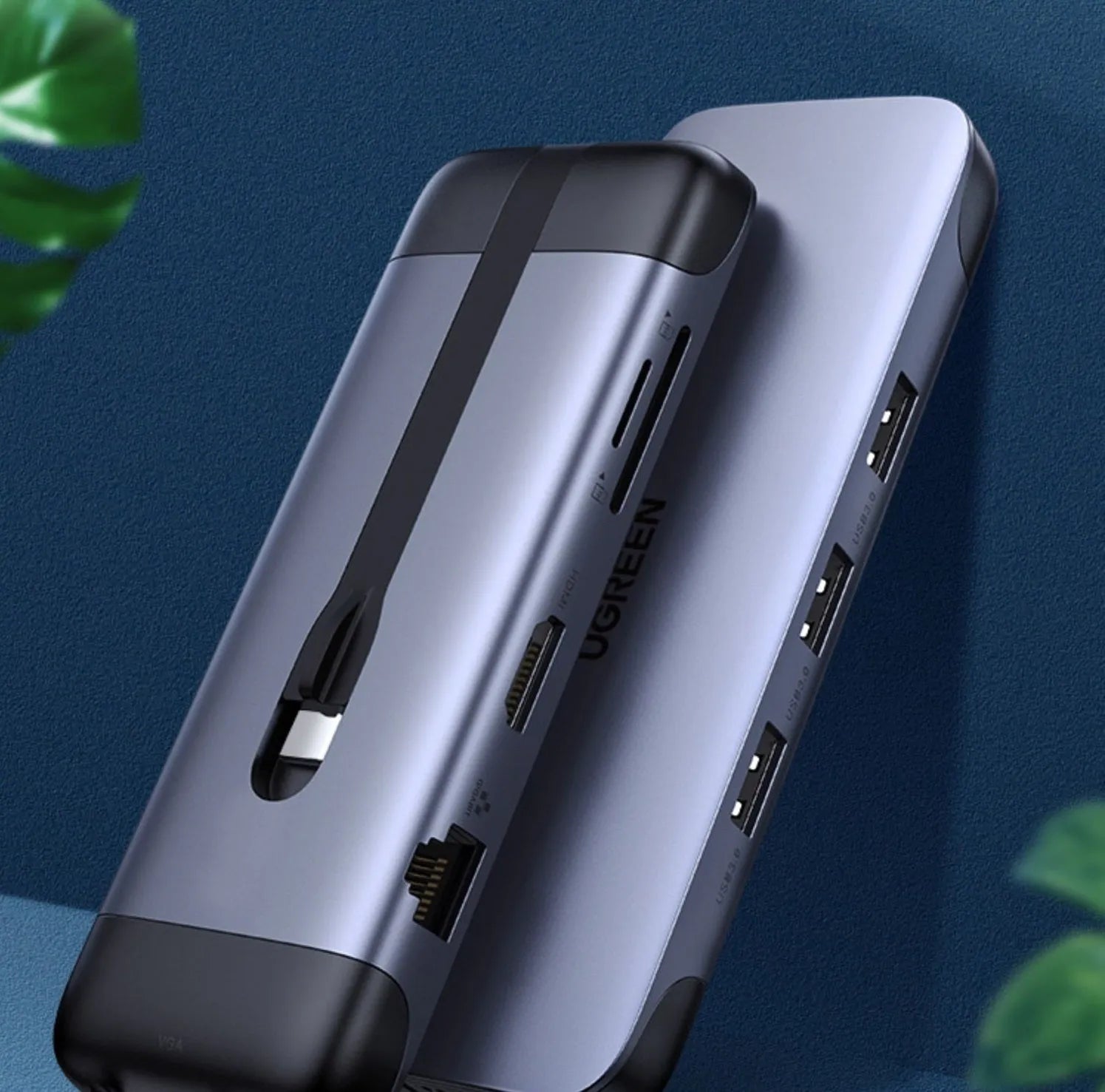 USB-C docking station hub showing HDMI port, USB 3.0 ports, and compact 0.09m design