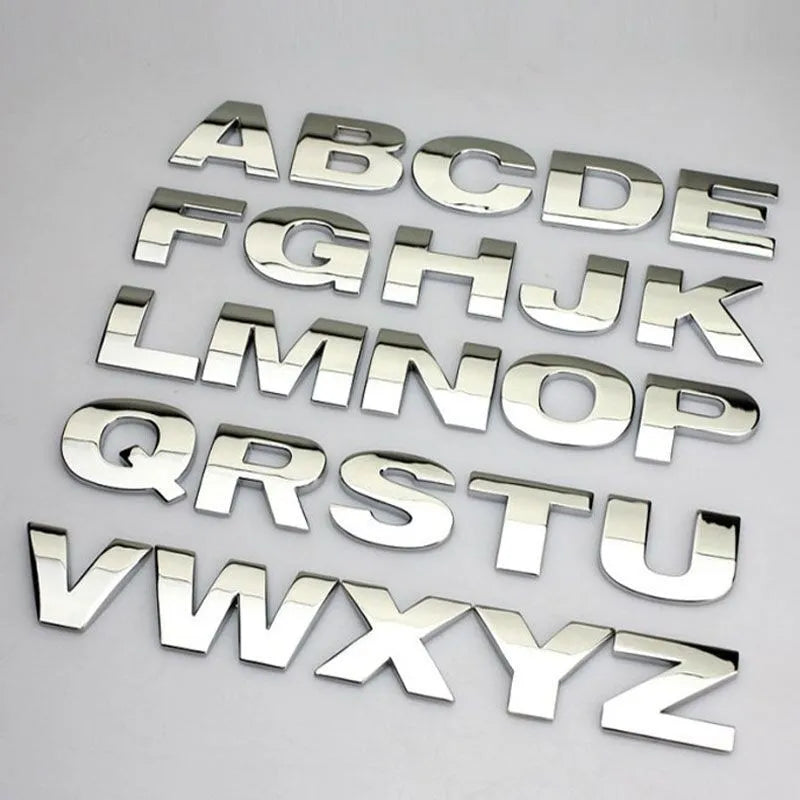 Zinc alloy 3D raised letter car sticker for bumper customisation in black or silver.