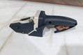 Blue multifunctional woodworking cutter with one-press lock for cutting gypsum, foam, cardboard, and KT board.