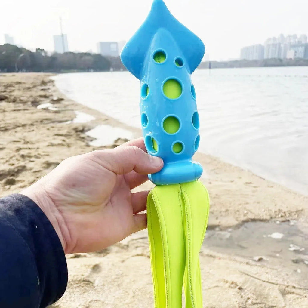 Blue cuttlefish-shaped squeaky dog chew toy, approximately 39cm long, made from rubber and cloth.