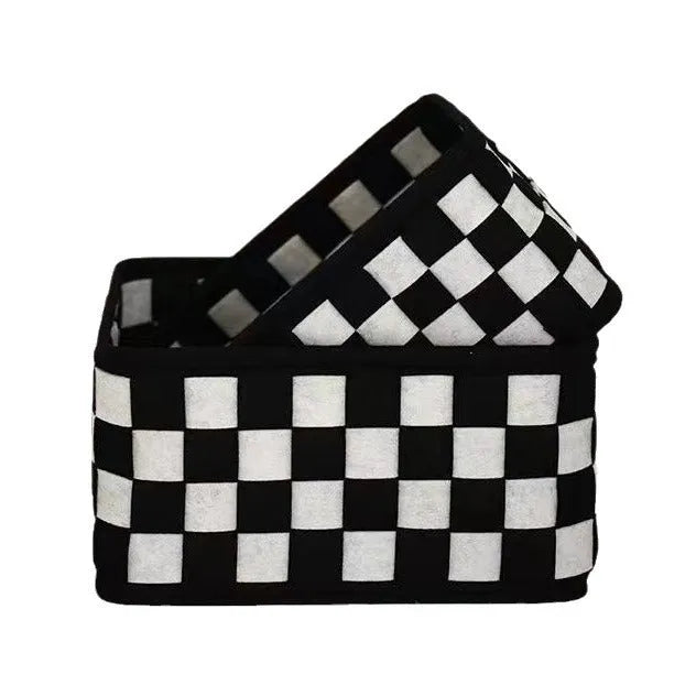 Checkerboard patterned folding felt storage basket showing collapsible sides.