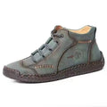 Men's brown cowhide leather high-top boots with rubber sole and front laces on a white background.
