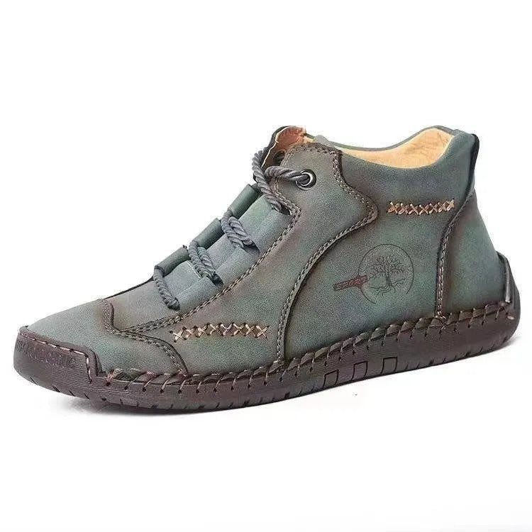 Men's brown cowhide leather high-top boots with rubber sole and front laces on a white background.