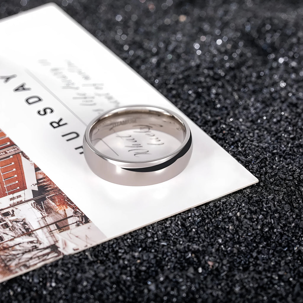Silver matte-finished titanium ring shown in 2mm, 4mm, and 6mm width options.