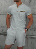 Men's grey waffle-texture zip-front polo collar top and shorts summer suit set.