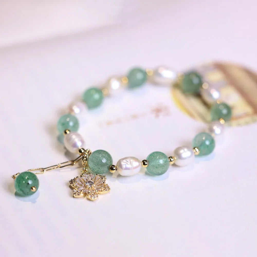 Green handmade freshwater pearl bracelet with strawberry pearls and Chinese knot design